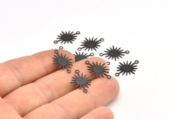 Black oxidised small sun charm/ connectors 1.8cm x 1.3cm x 6 pieces - 2 holes.