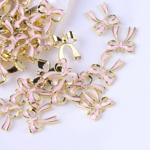 Gold plated pink enamel bow charms x 6 pieces