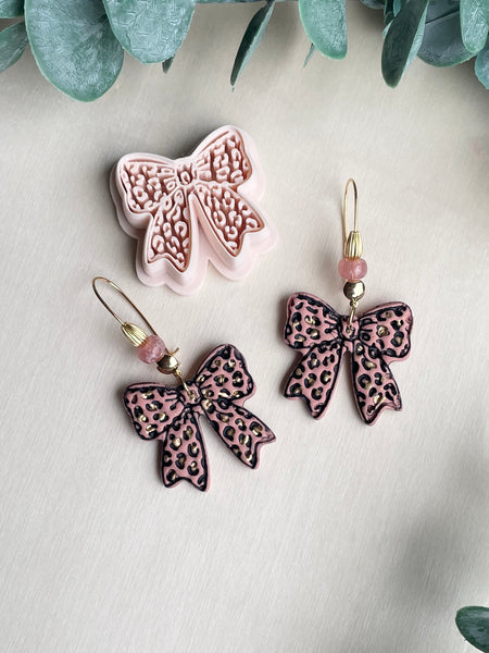 Leopard Bow cutter
