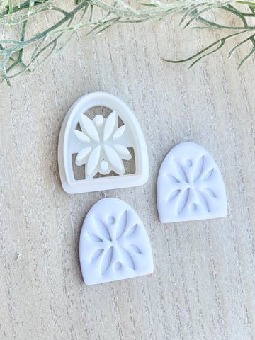 Iris arch cutter
