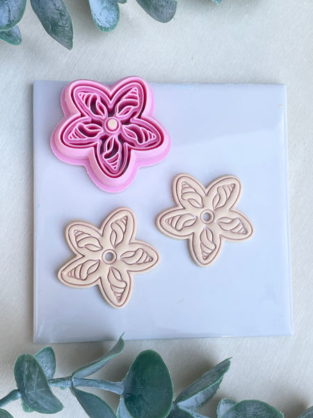 Cone shell flower cutter
