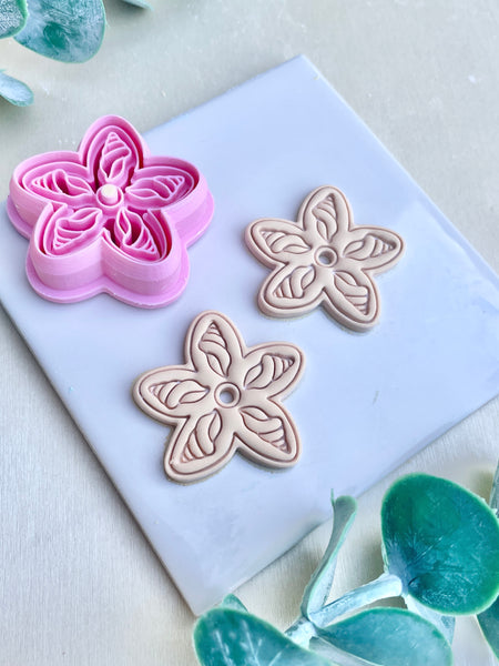 Cone shell flower cutter