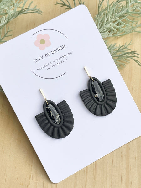 Black and oval fan dangles