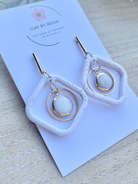 Modern dusty white granite square with shell charm detail