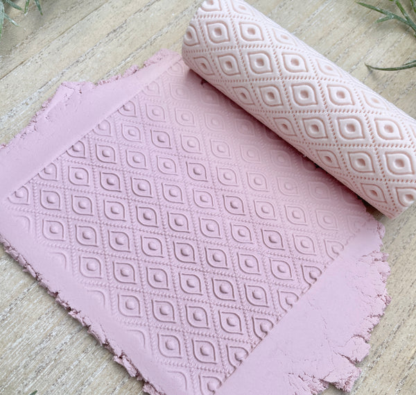 Diamond dot texture roller