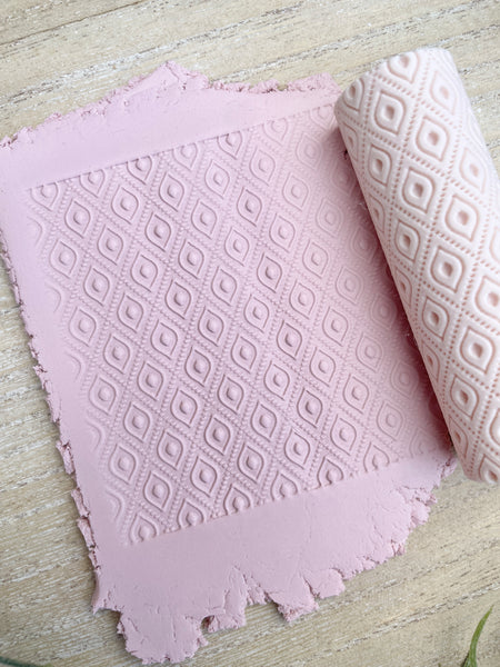 Diamond dot texture roller