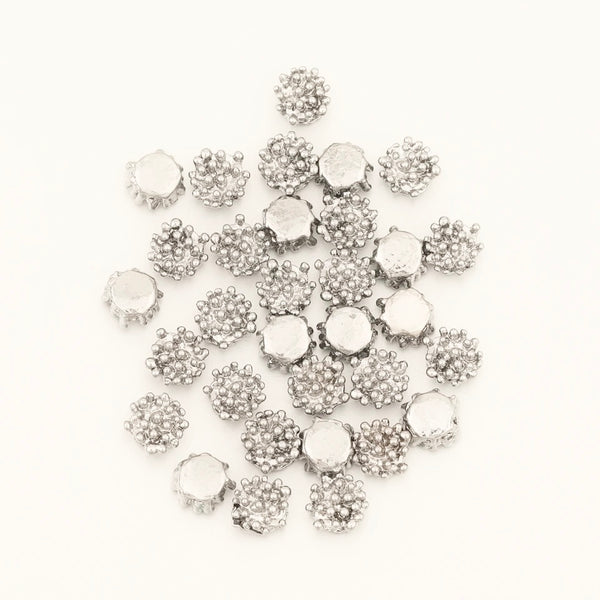 Tiny Flower centre embellishments rhodium plated x 10 pieces