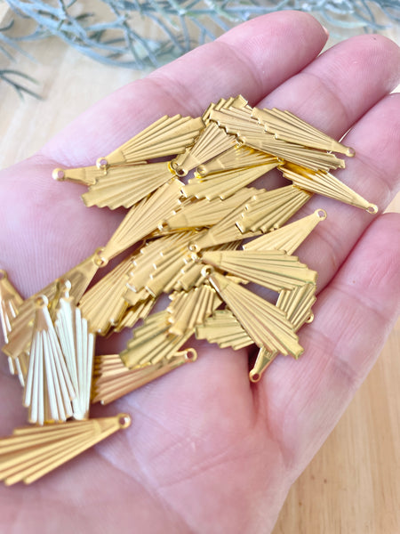 Gold plated art deco charms x 8  2.3cm