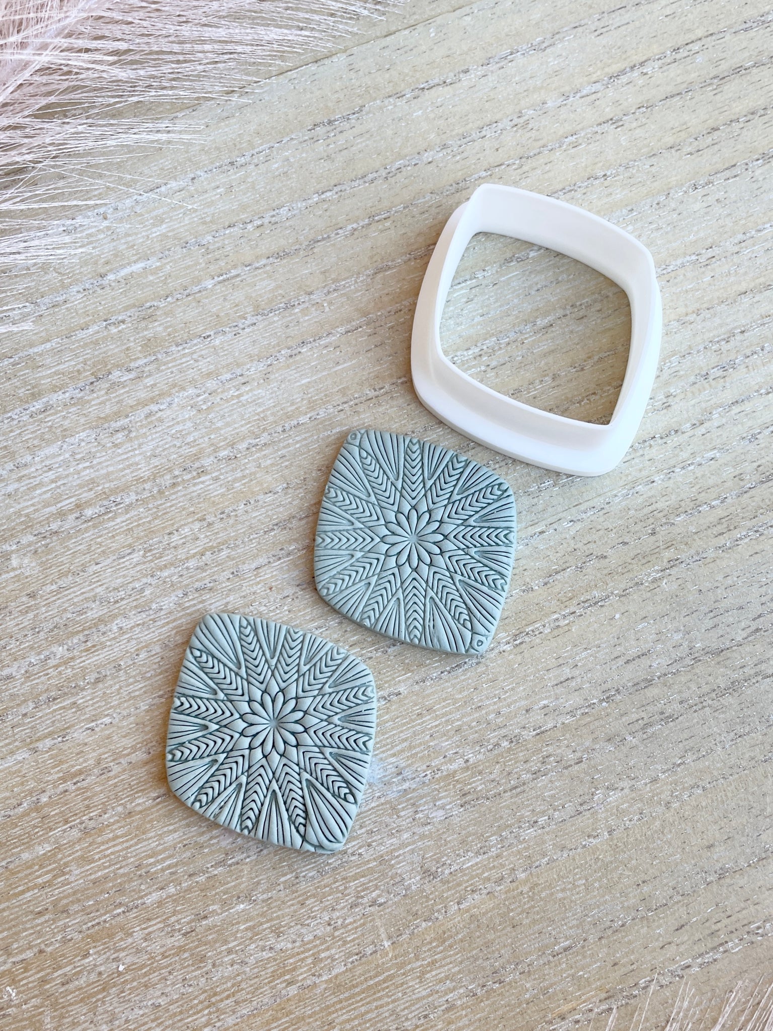 Emmy rounded diamond shape