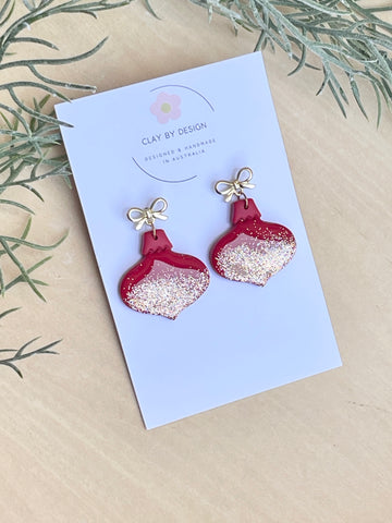 Red & gold glitter shinny ornaments with bow stud tops