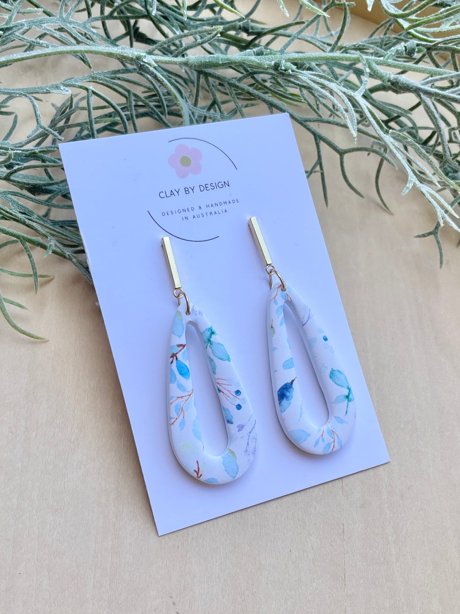 Soft blue leaf print long drop dangles