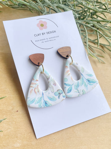 Muted blue and green florals long triangle dangles