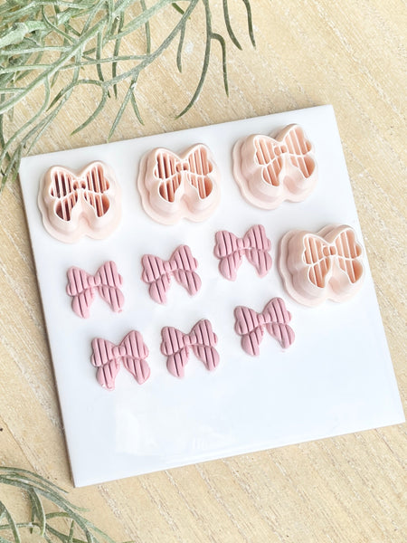 Lined bow stud or charm cutter