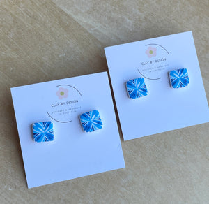 Blue patterned square studs