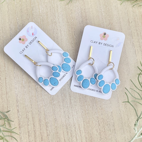 Blue and white art deco dangles