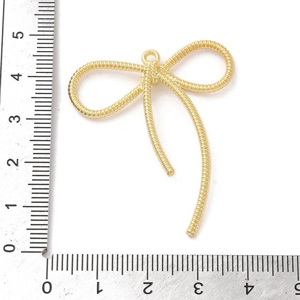 Gold plated texture bow charms x 6