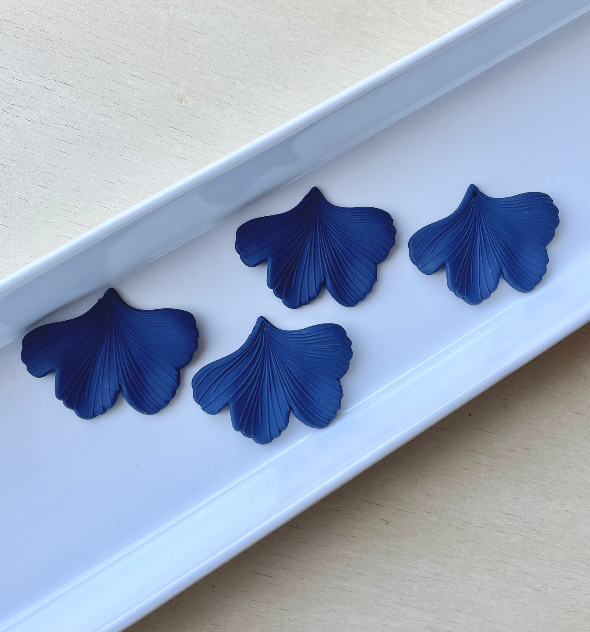 NAVY ginkgo charms  x 4 pieces