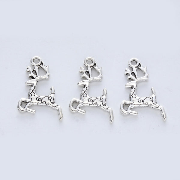 Tibetan silver plated Reindeer charms x 8 pieces